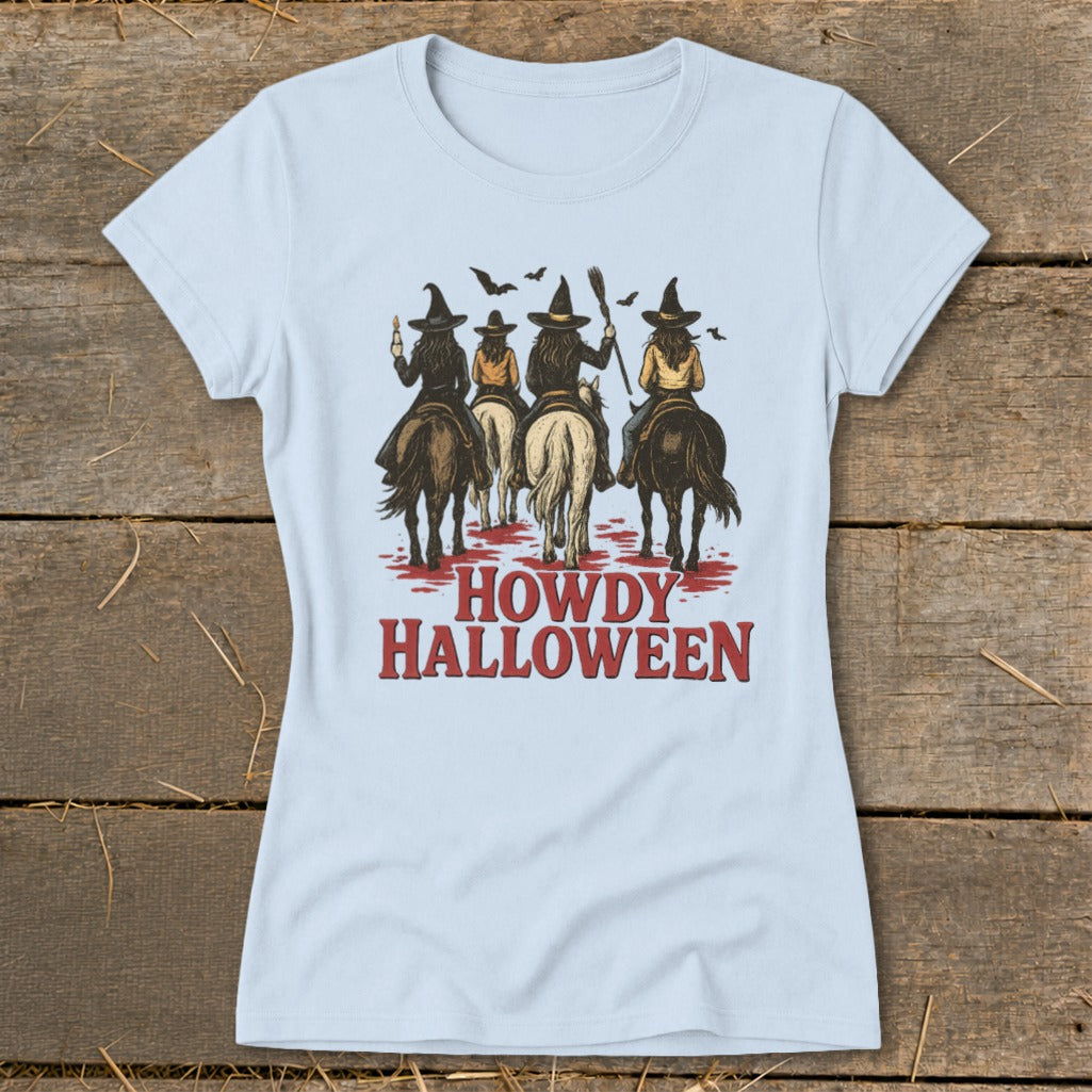 Four witches on horseback in silhouette, with "Howdy Halloween" text below.