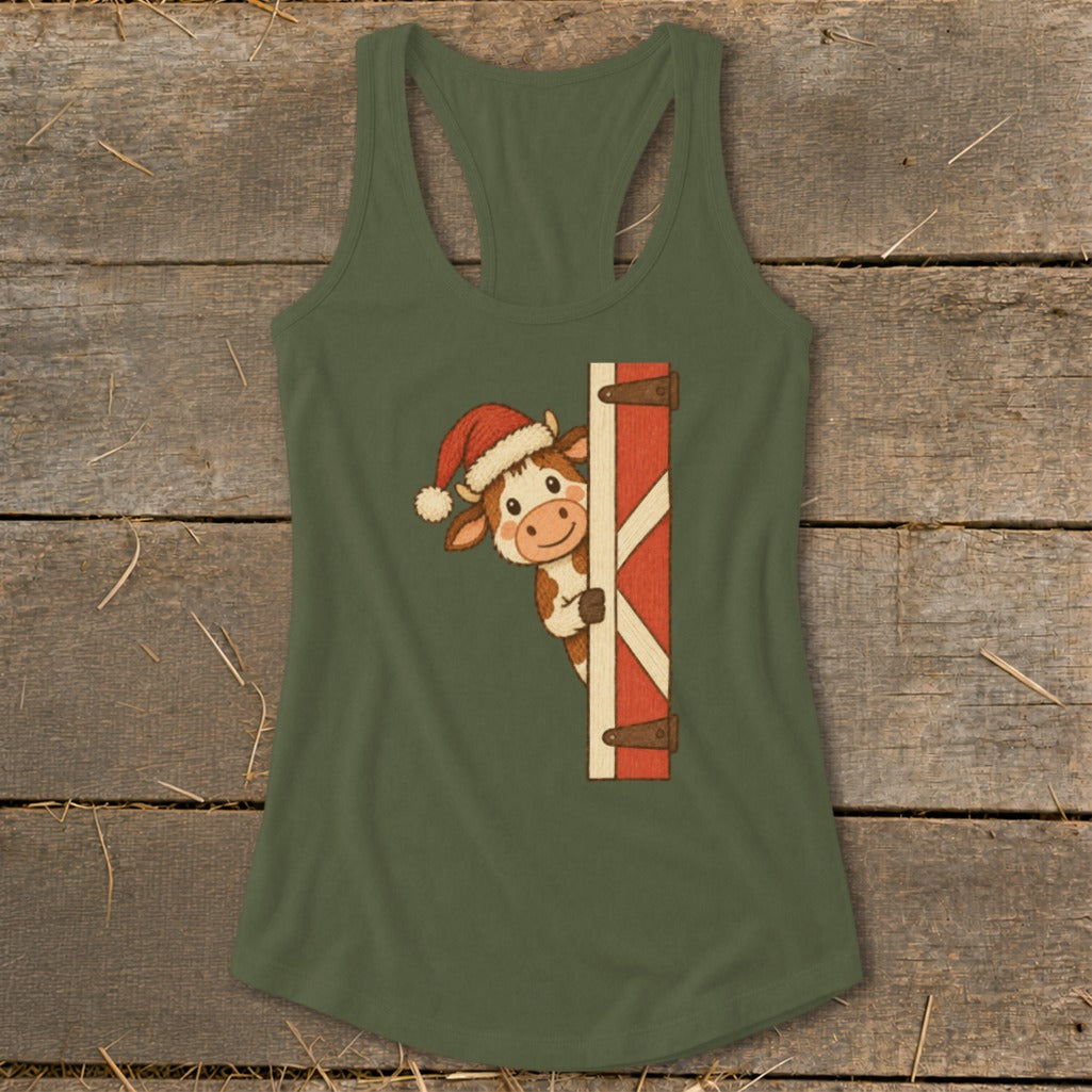 Green tank top with a cartoon cow wearing a Santa hat peeking from behind a barn door.
