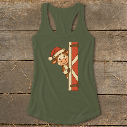 Green tank top with a cartoon cow wearing a Santa hat peeking from behind a barn door.