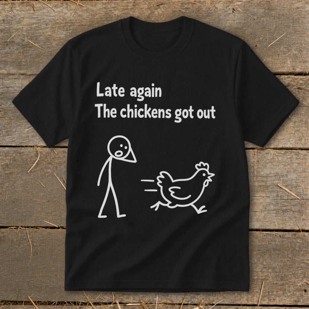 Black t-shirt with white text and stick figure drawing of a person and a running chicken.