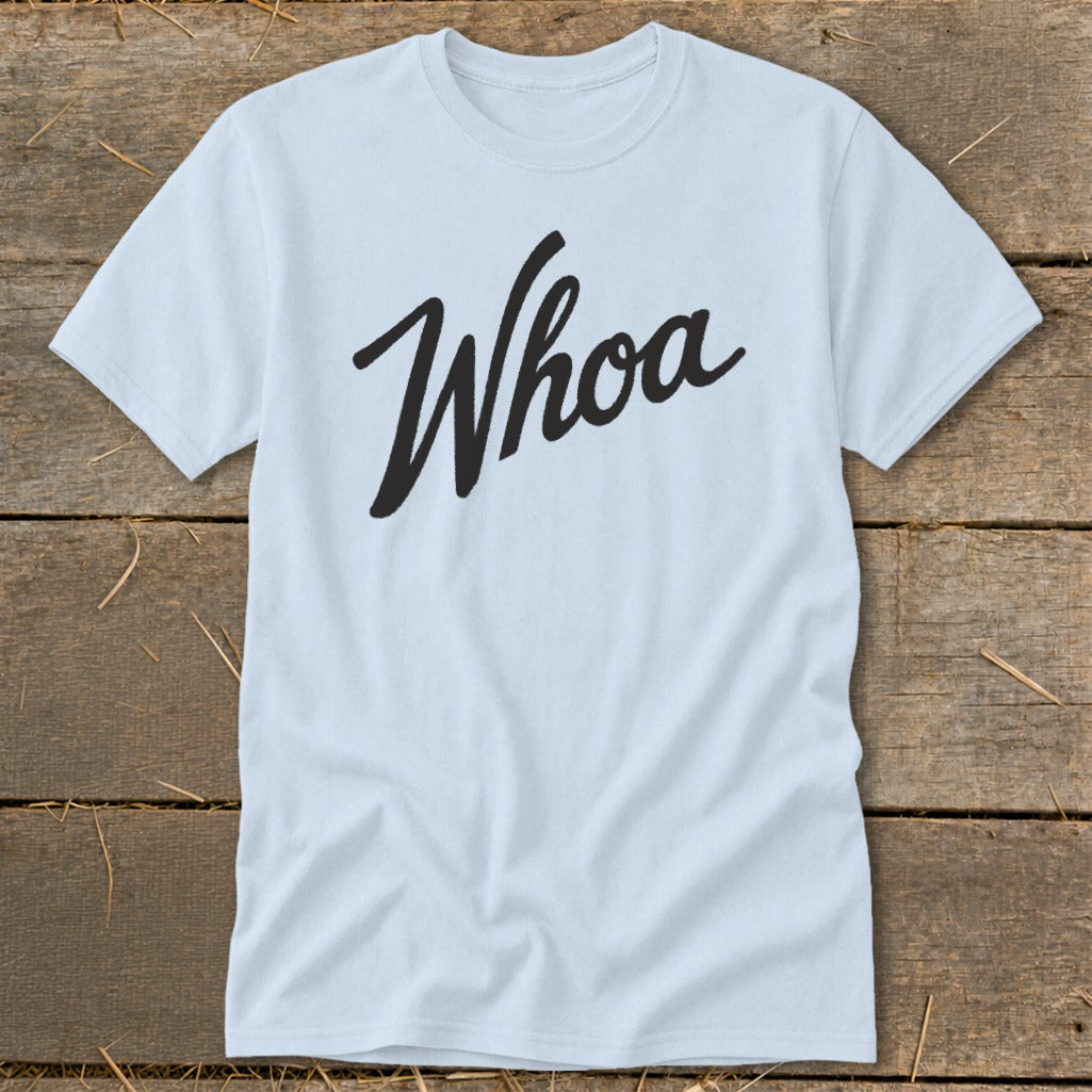 Light blue t-shirt with "Whoa" in black cursive text.