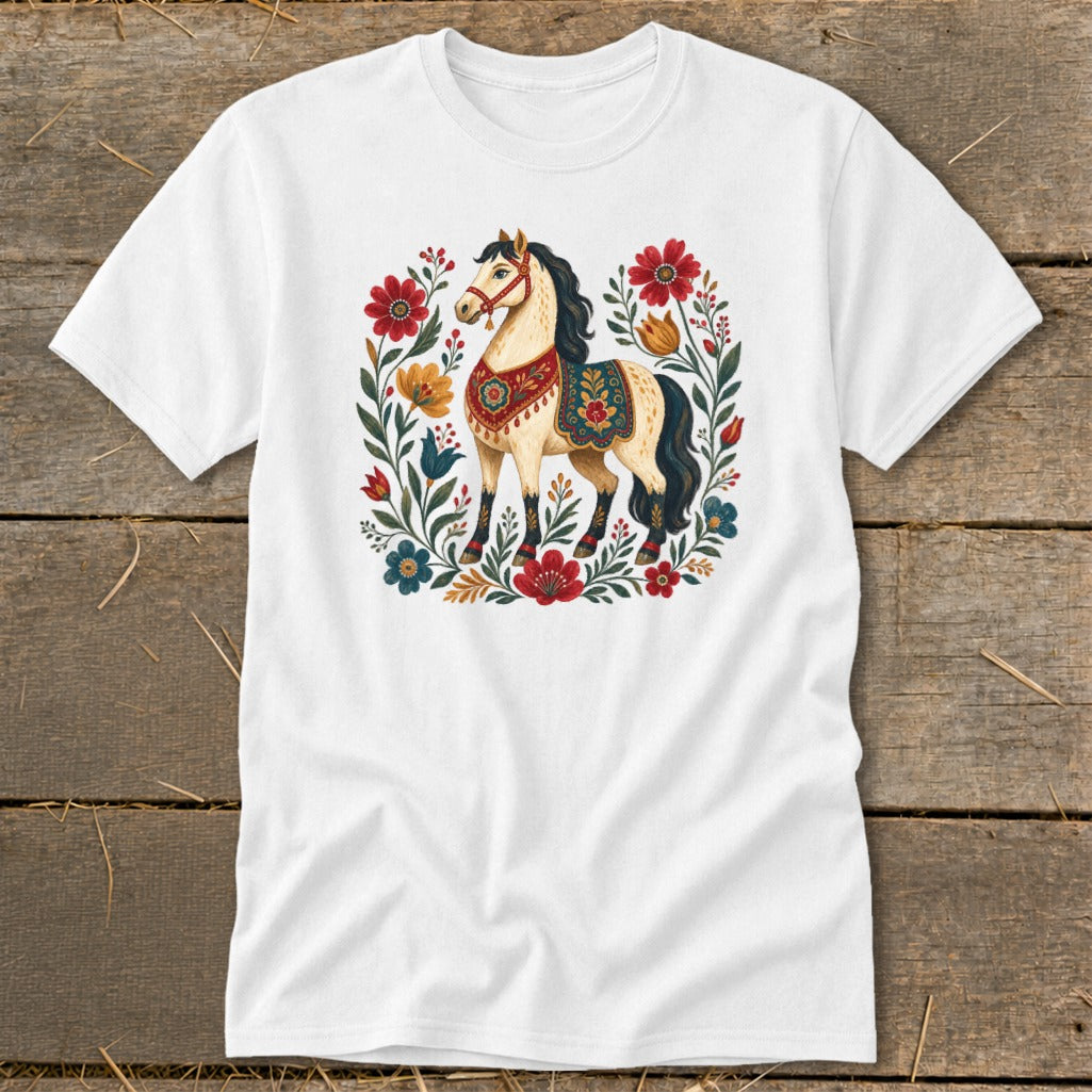 White t-shirt with folk art illustration of a horse surrounded by flowers.