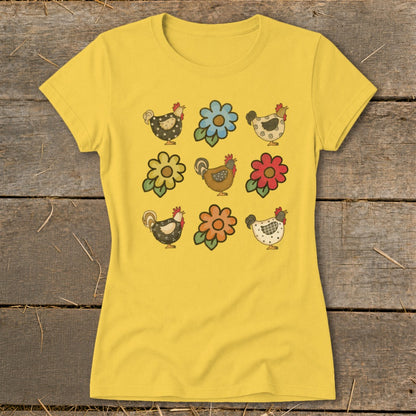 Yellow t-shirt with a repeating pattern of chickens and flowers.
