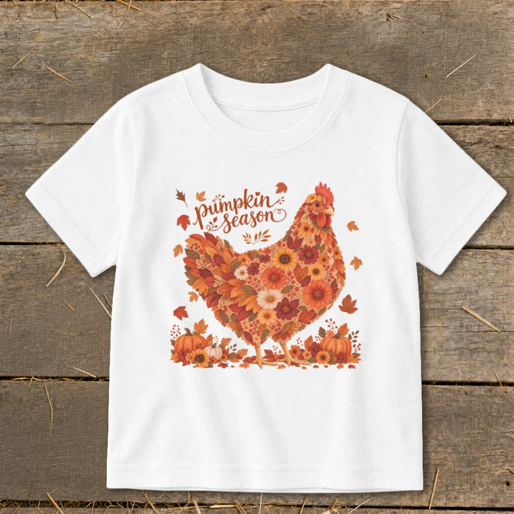 White t-shirt with floral chicken and "pumpkin season" text.