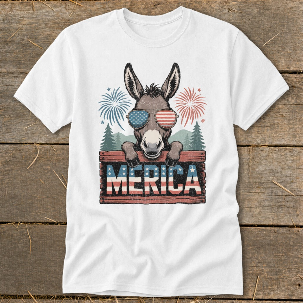 Donkey wearing American flag sunglasses peeks over a wooden sign that reads "MERICA".