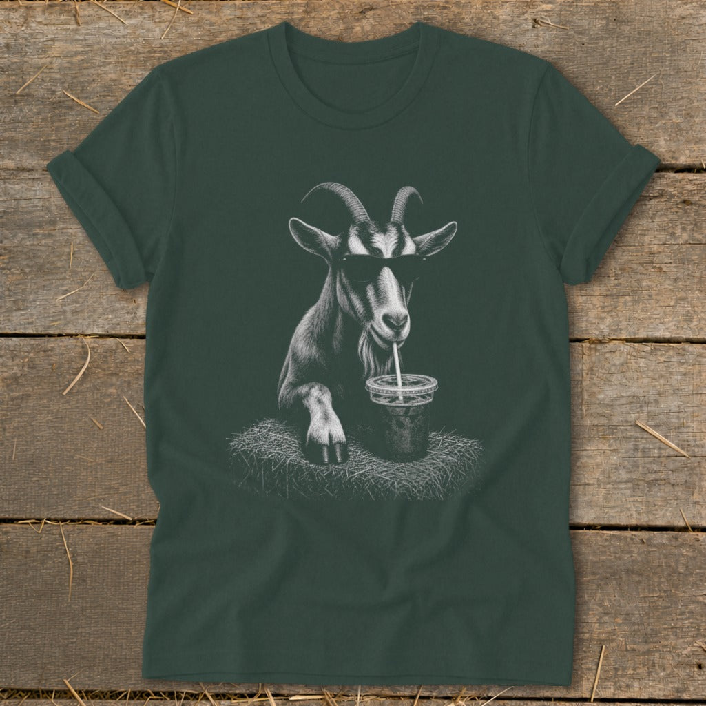 Goat wearing sunglasses sips a drink while sitting on hay.