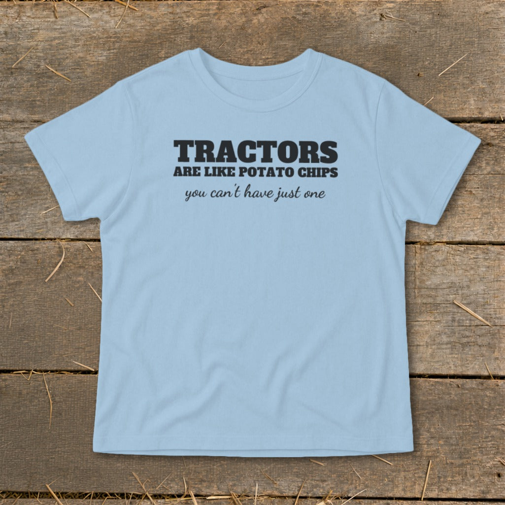 Light blue t-shirt with "Tractors are like potato chips you can't have just one" text.
