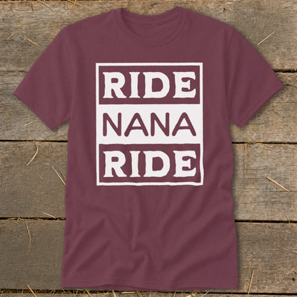 Maroon t-shirt with white text "RIDE NANA RIDE" in a framed box.