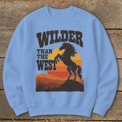 Light blue sweatshirt with "Wilder Than The West" text and a rearing horse.