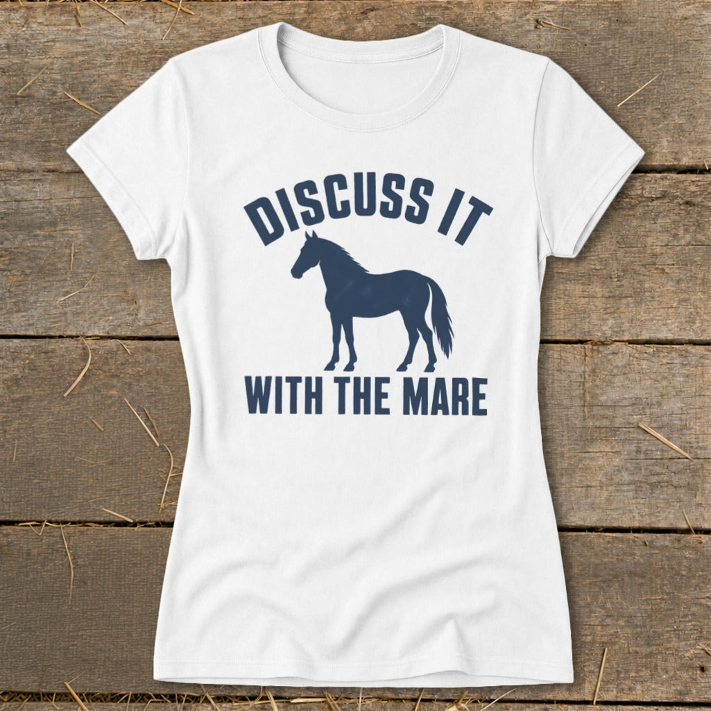 White t-shirt with navy text "DISCUSS IT" above a horse silhouette, and "WITH THE MARE" below.