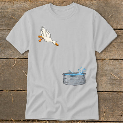 Light gray t-shirt with cartoon of a goose jumping into a galvanized tub of water.