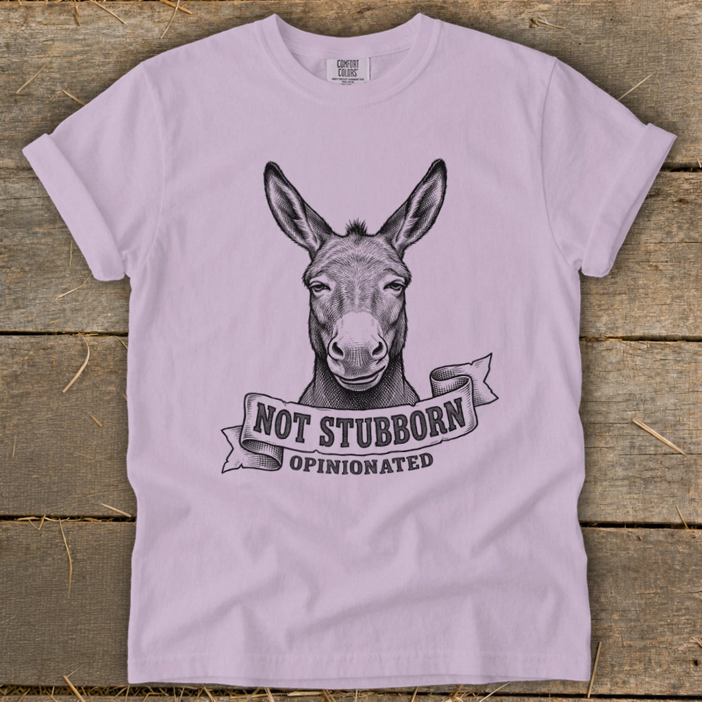 Light purple t-shirt with a sketch of a donkey and the text "NOT STUBBORN, OPINIONATED".