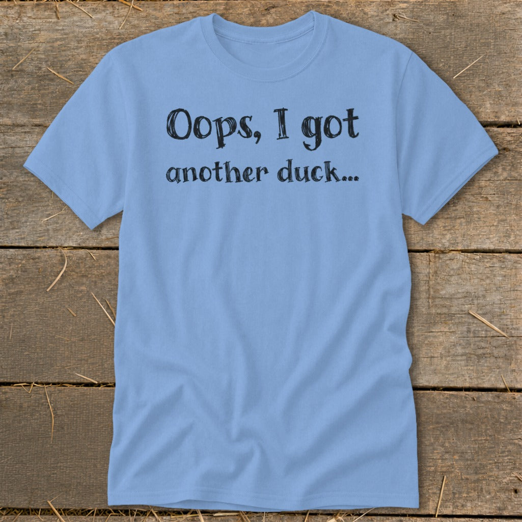 Light blue t-shirt with black text: "Oops, I got another duck..."
