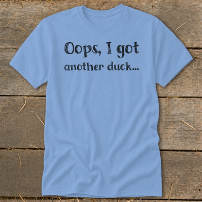 Light blue t-shirt with black text: "Oops, I got another duck..."