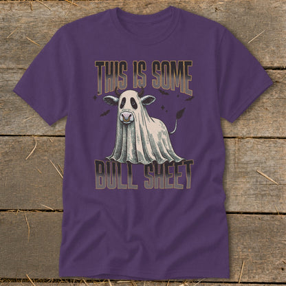 Purple t-shirt with a cartoon cow dressed as a ghost and text "THIS IS SOME BULL SHEET".