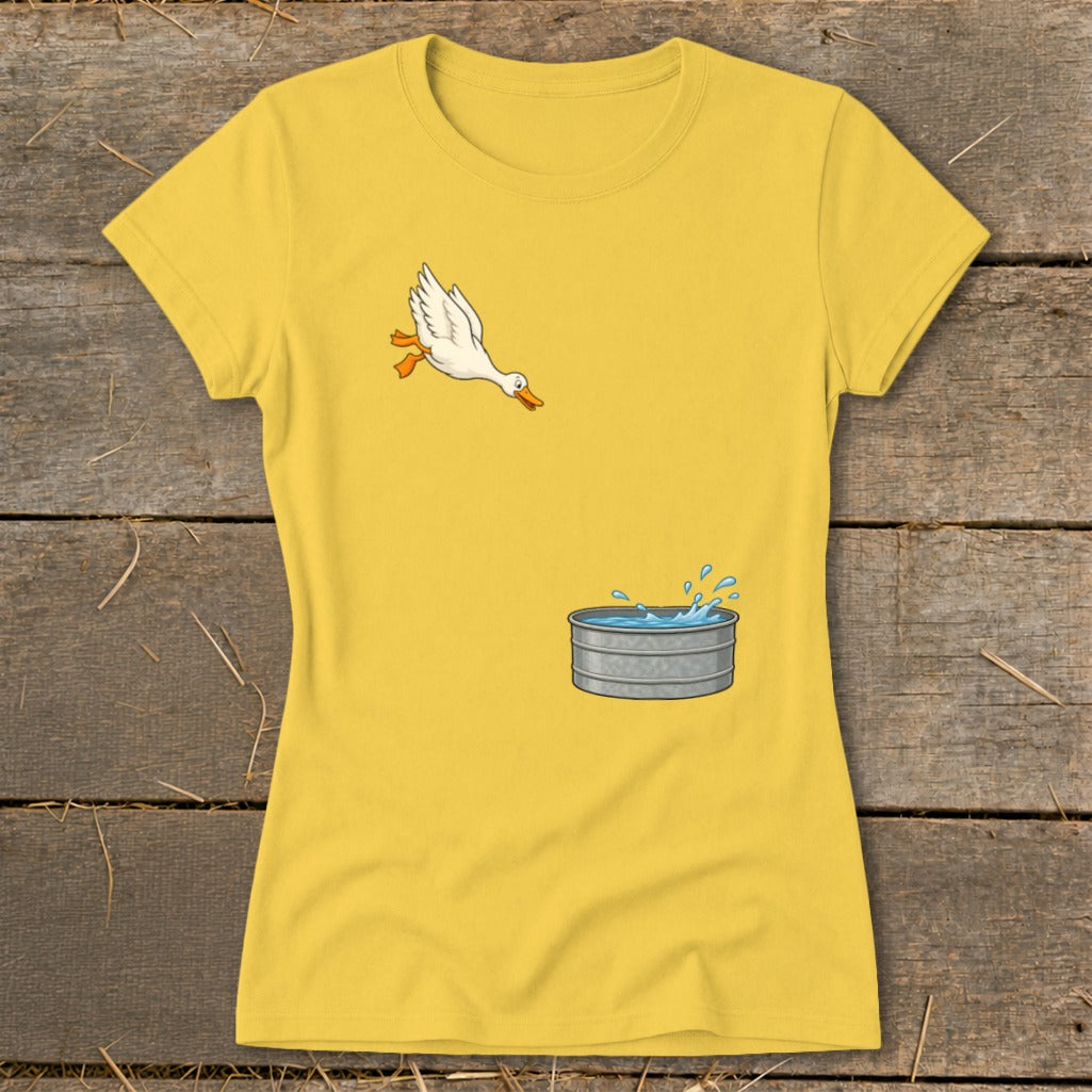 Yellow t-shirt with cartoon white duck jumping into galvanized tub of water.