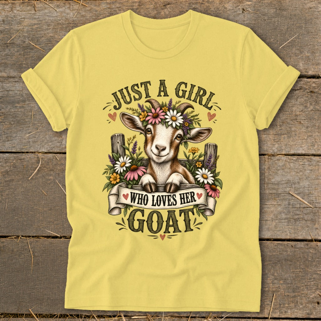 Yellow t-shirt with a goat wearing flowers and text "Just a girl who loves her goat".