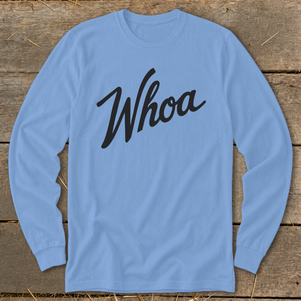 Blue long sleeve shirt with black script text that reads "Whoa."