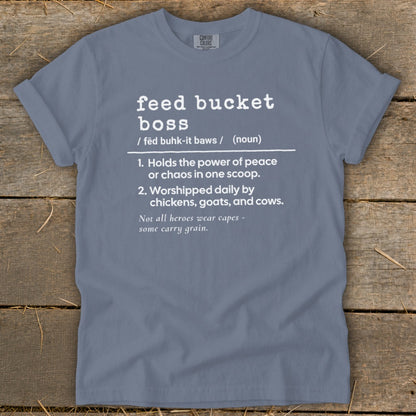 T-shirt with white text defining "feed bucket boss" and a saying about heroes.