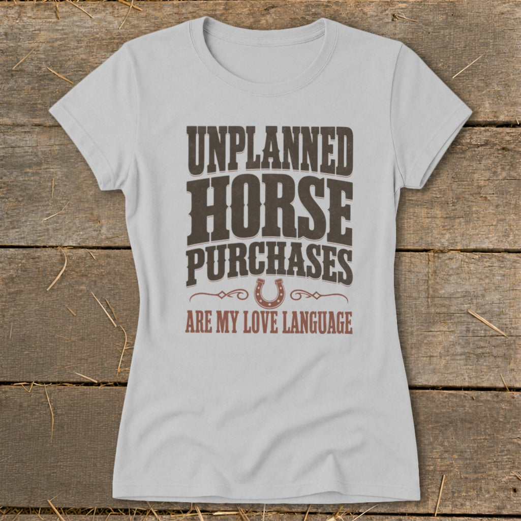 Light gray t-shirt with text "UNPLANNED HORSE PURCHASES ARE MY LOVE LANGUAGE".