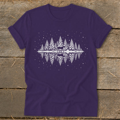 Purple t-shirt with a white graphic of a horse in a snowy forest reflected in water.