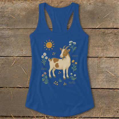Blue tank top with a brown and white goat surrounded by flowers and the sun.