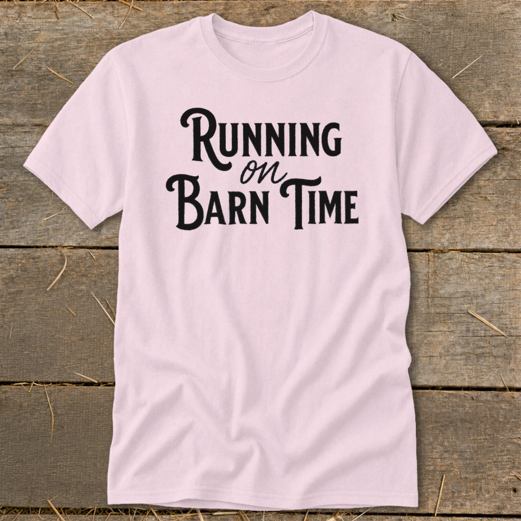 Pink t-shirt with "Running on Barn Time" text in black.