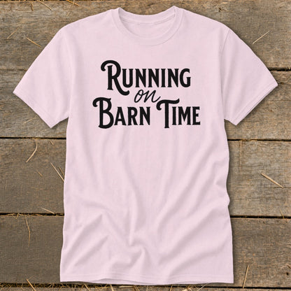 Pink t-shirt with "Running on Barn Time" text in black.
