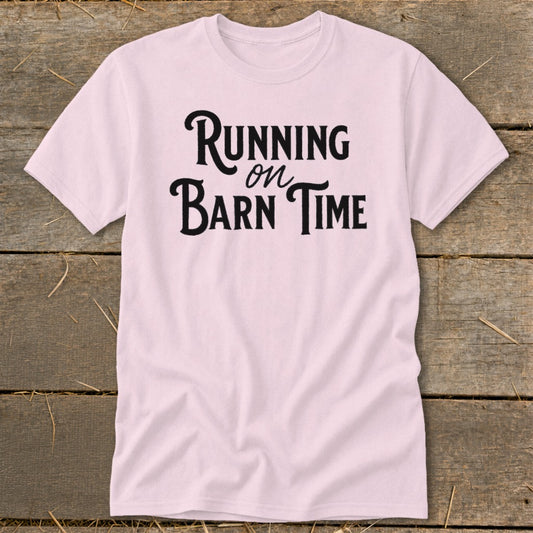Pink t-shirt with "Running on Barn Time" text in black.