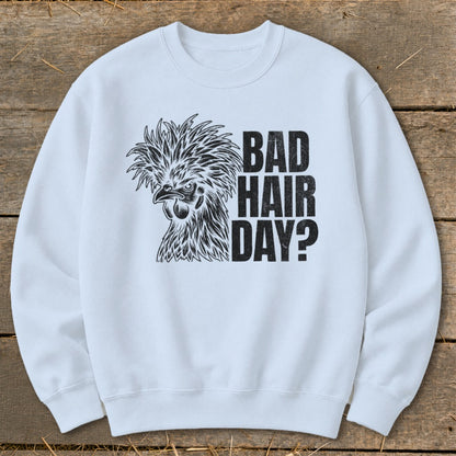 White sweatshirt with black graphic of a chicken and text "BAD HAIR DAY?".