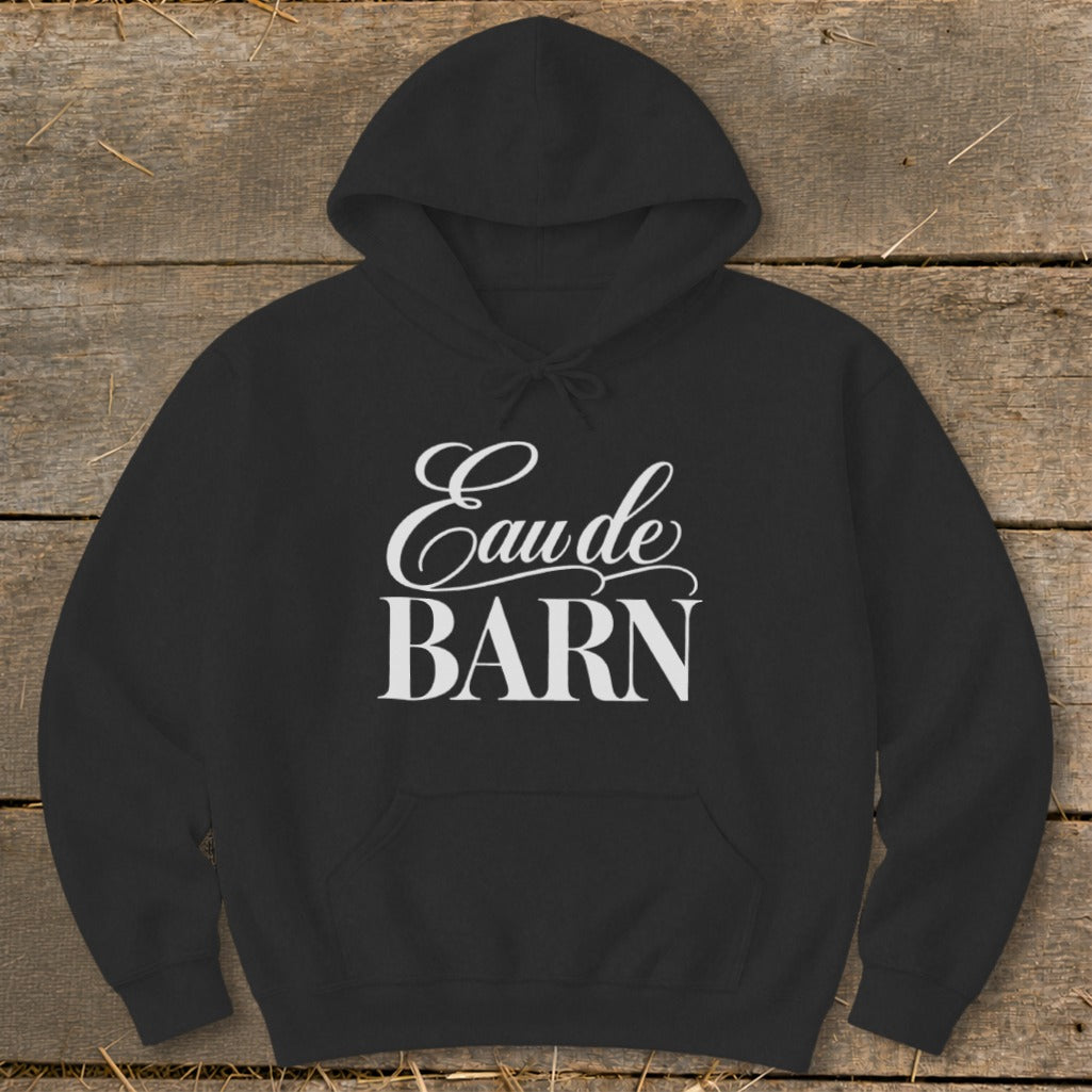 Black hoodie with white text "Eau de BARN" on the chest