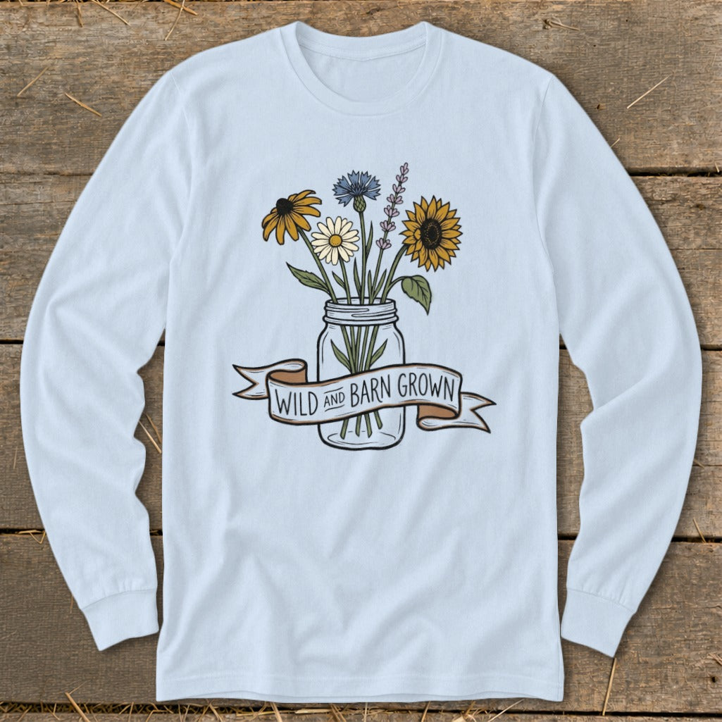 Light blue long sleeve shirt with a mason jar of flowers and "Wild and Barn Grown" banner.