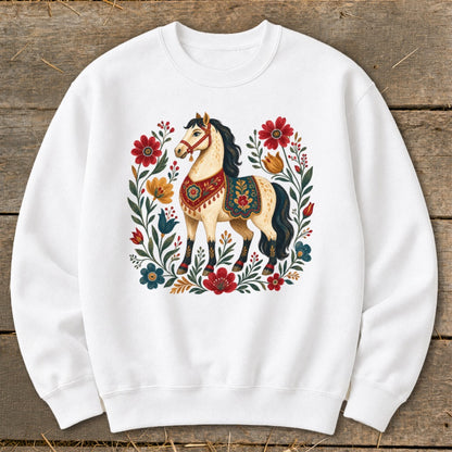 White sweatshirt with a cream horse illustration surrounded by colorful flowers.