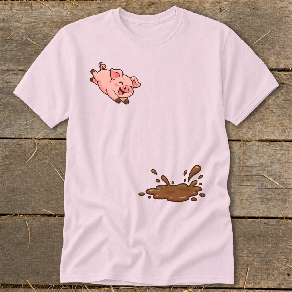 Pink t-shirt with cartoon pig jumping into a mud puddle design.