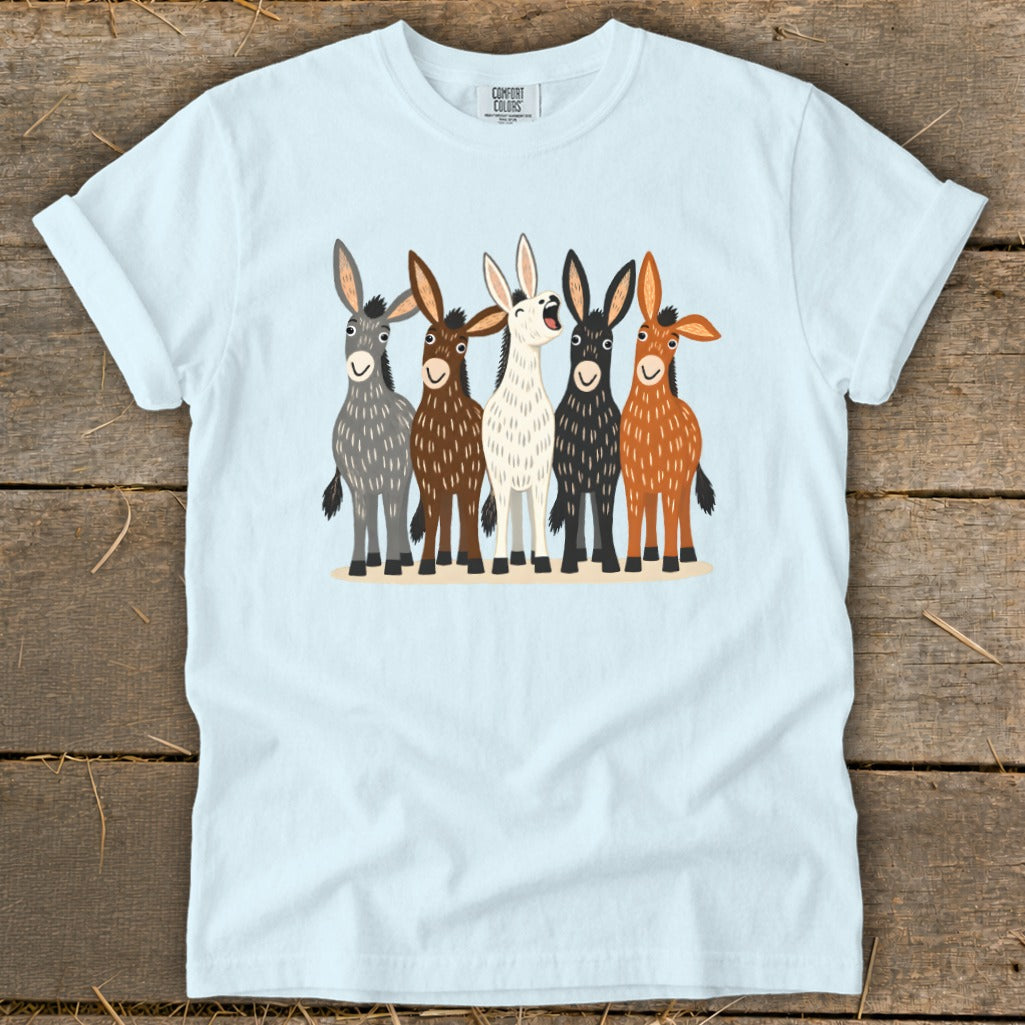 Light blue crewneck t-shirt featuring a front graphic of five colorful donkeys standing together.