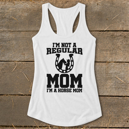 White tank top with "I'm Not A Regular Mom, I'm A Horse Mom" text and horseshoe graphic.