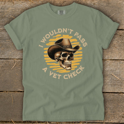 Green t-shirt with skull wearing cowboy hat and text "I wouldn't pass a vet check".