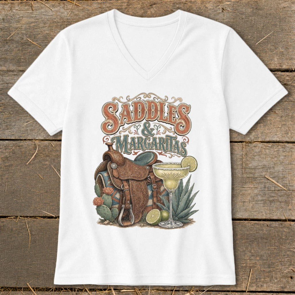 White v-neck t-shirt with "Saddles & Margaritas" graphic.