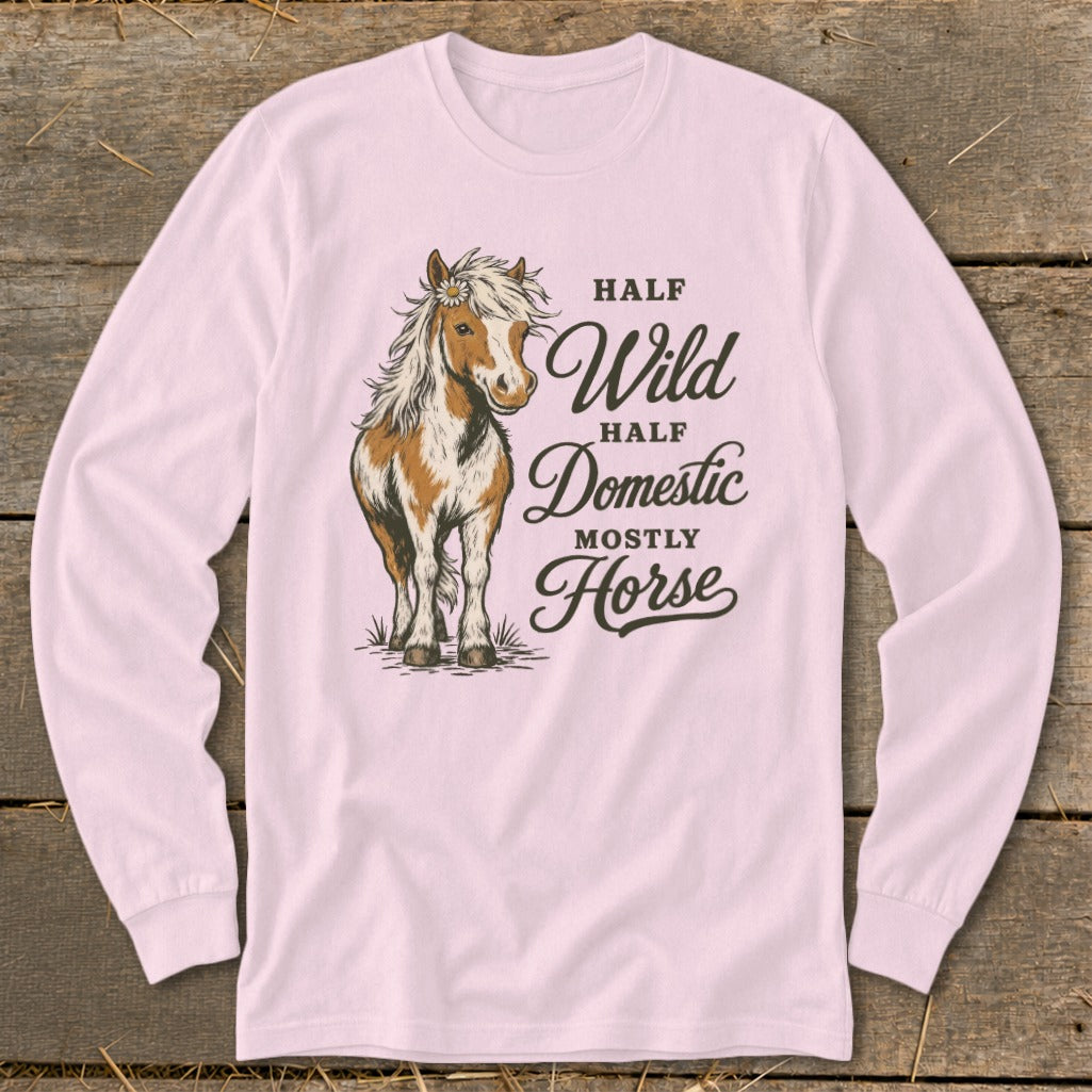 Pink long-sleeve shirt with a horse illustration and text "Half Wild, Half Domestic, Mostly Horse".