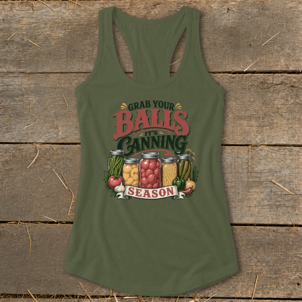 Green tank top with "Grab Your Balls It's Canning Season" text and jars of preserved vegetables.