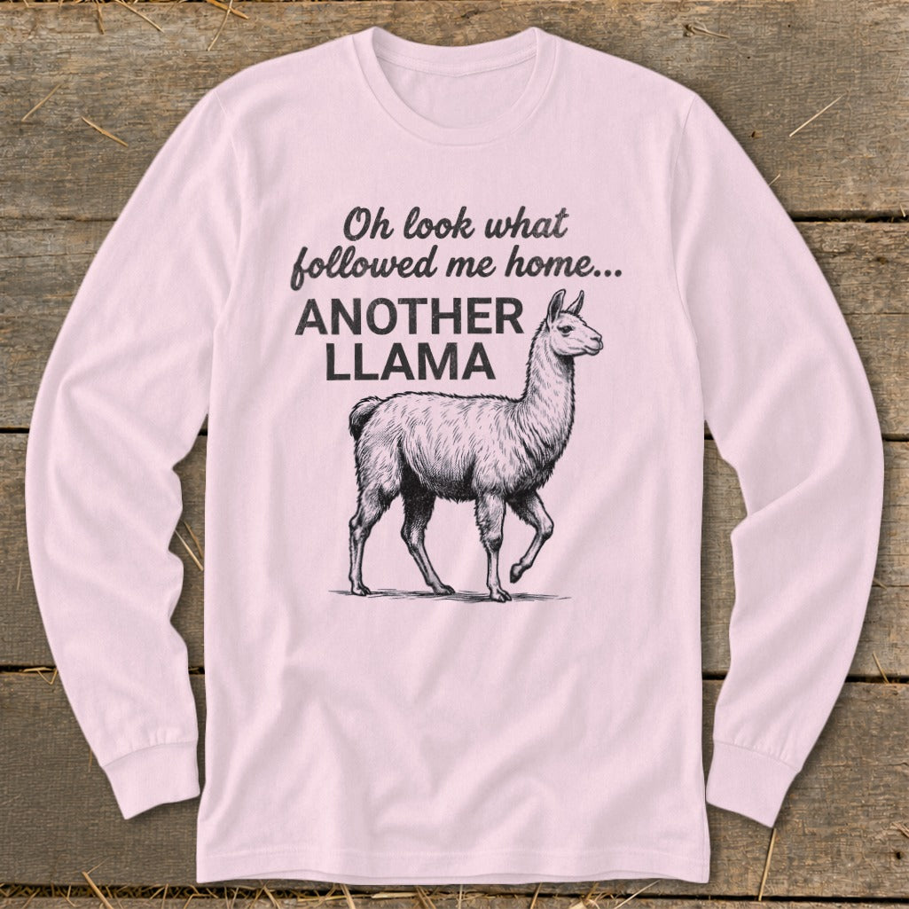 Long sleeve pink shirt with "Oh look what followed me home... ANOTHER LLAMA" text and llama graphic.