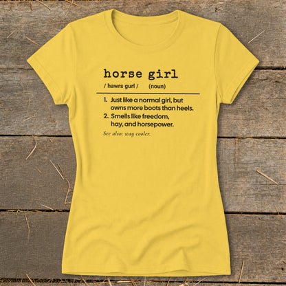 Yellow t-shirt with black text defining "horse girl" and its characteristics.