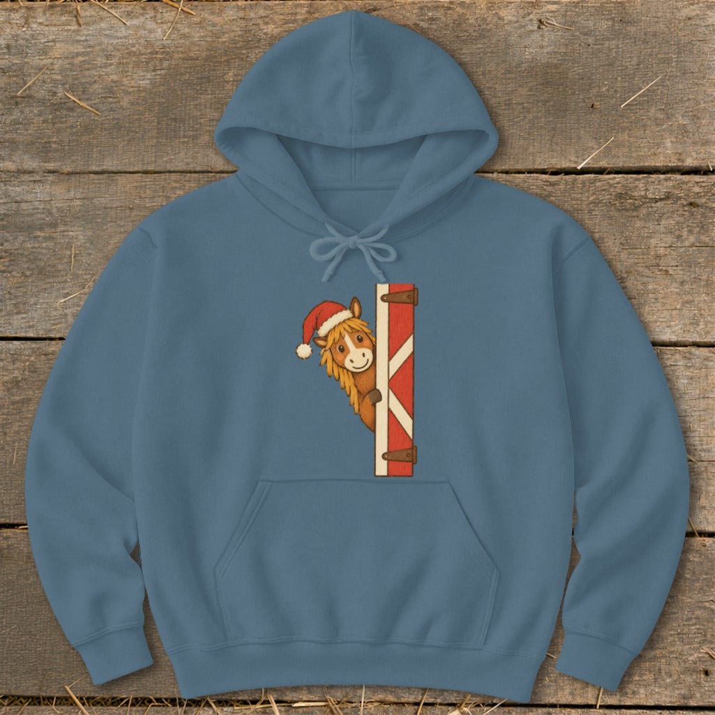 Blue hoodie with a cartoon horse wearing a Santa hat peeking from behind a barn door.