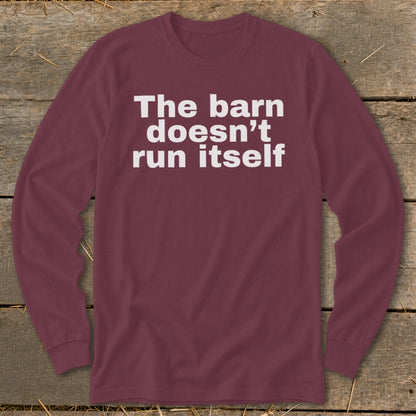 Maroon long sleeve shirt with white text "The barn doesn't run itself".