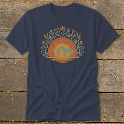 Girl and horse silhouetted at sunset with flowers and wheat design.