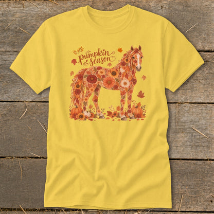 Yellow t-shirt with a horse design made of flowers, leaves, and pumpkins.