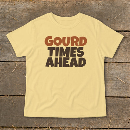 Pale yellow t-shirt with "Gourd Times Ahead" text in brown and dark brown.