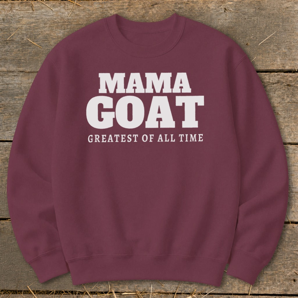 Maroon sweatshirt with "MAMA GOAT GREATEST OF ALL TIME" text in white.