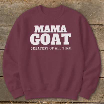 Maroon sweatshirt with "MAMA GOAT GREATEST OF ALL TIME" text in white.