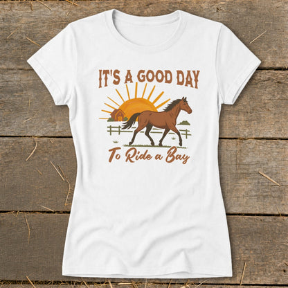 White t-shirt with a bay horse, barn, sun, and text "IT'S A GOOD DAY To Ride a Bay".